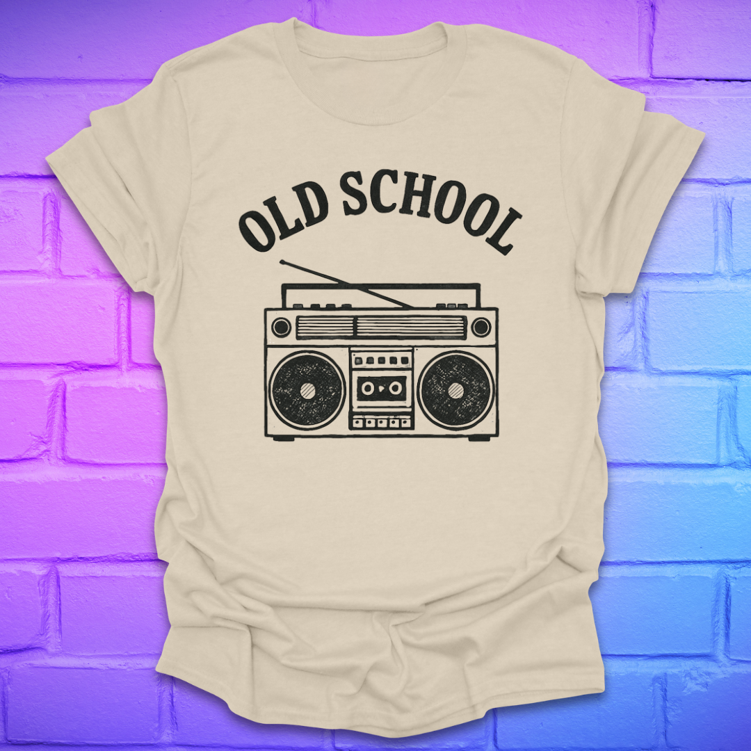 Beige t-shirt with 'Old School' and boombox graphic on a brick wall background