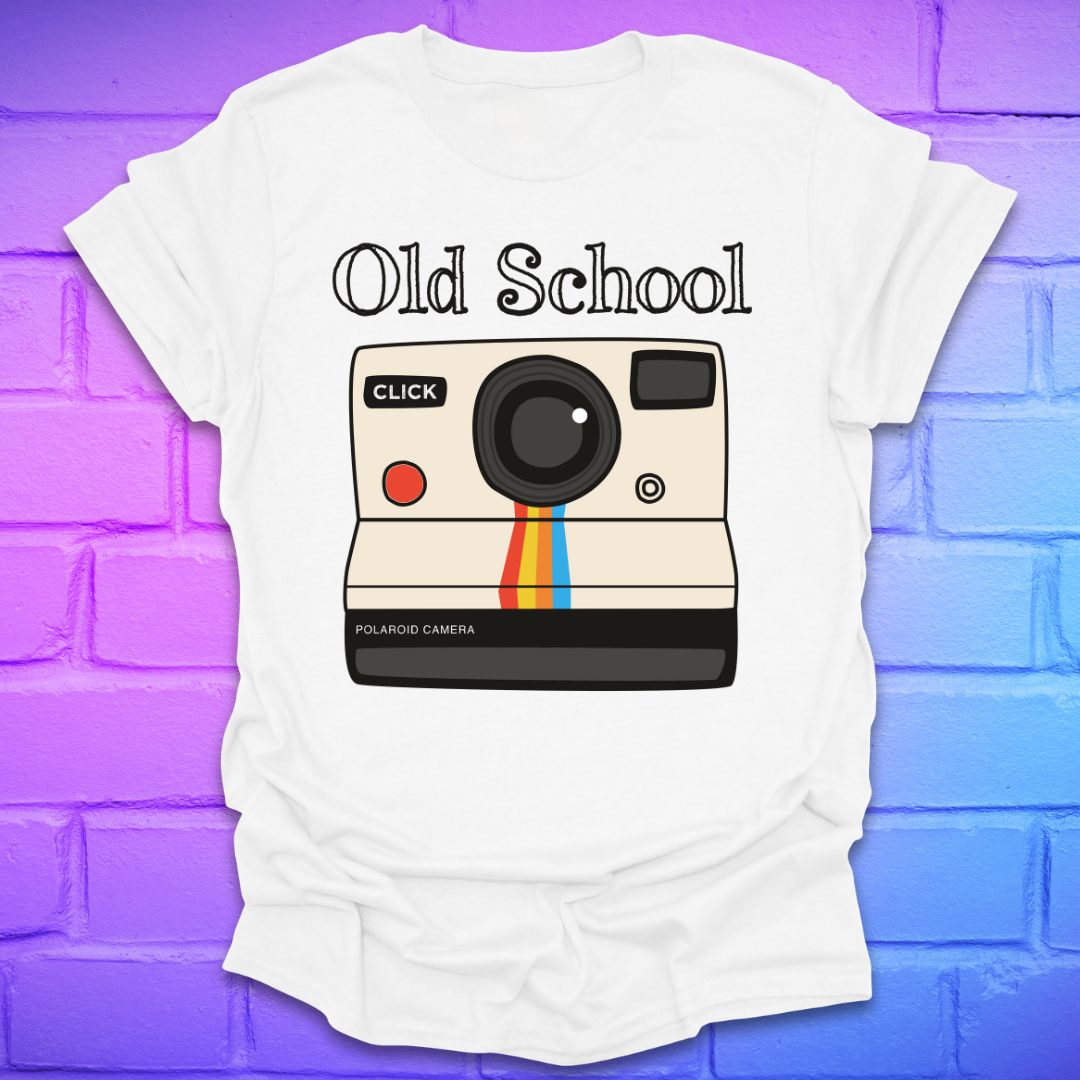 White t-shirt with a graphic of an polaroid camera and 'Old School' text on a brick wall background.