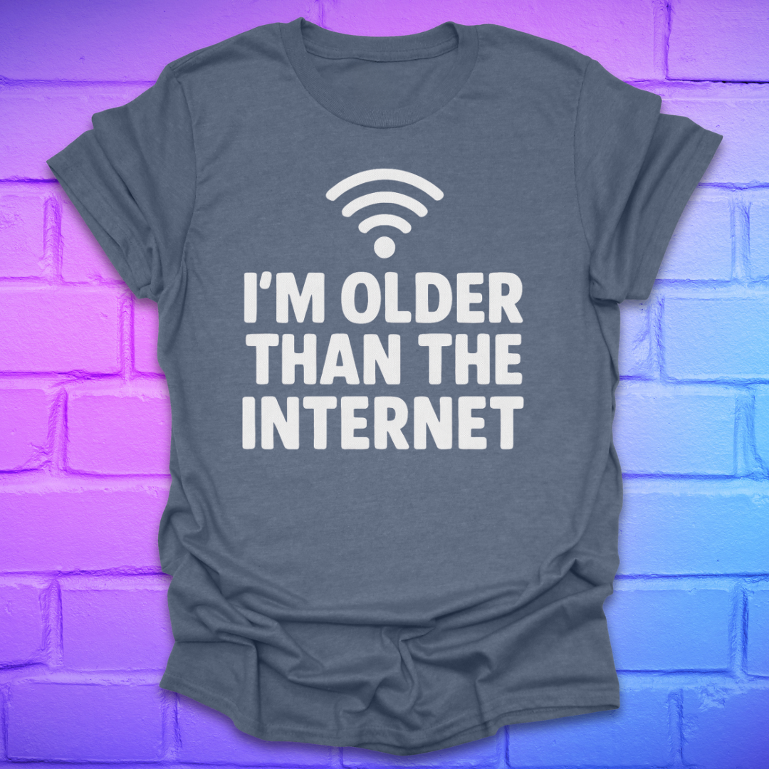 Indigo t-shirt with 'I'm older than the internet' text on a brick wall background