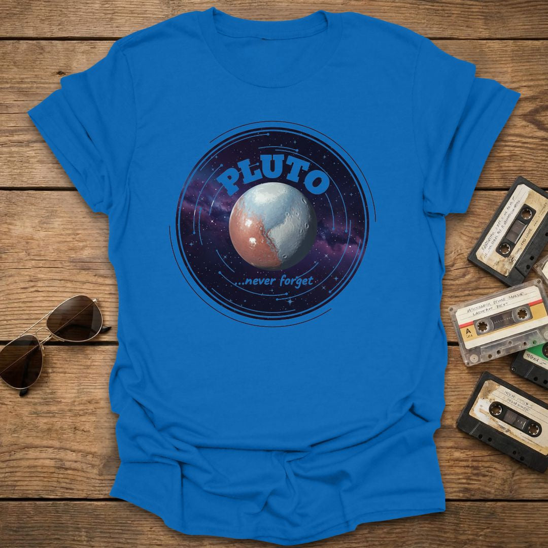 Blue t-shirt with Pluto graphic on a wooden surface with vintage items.