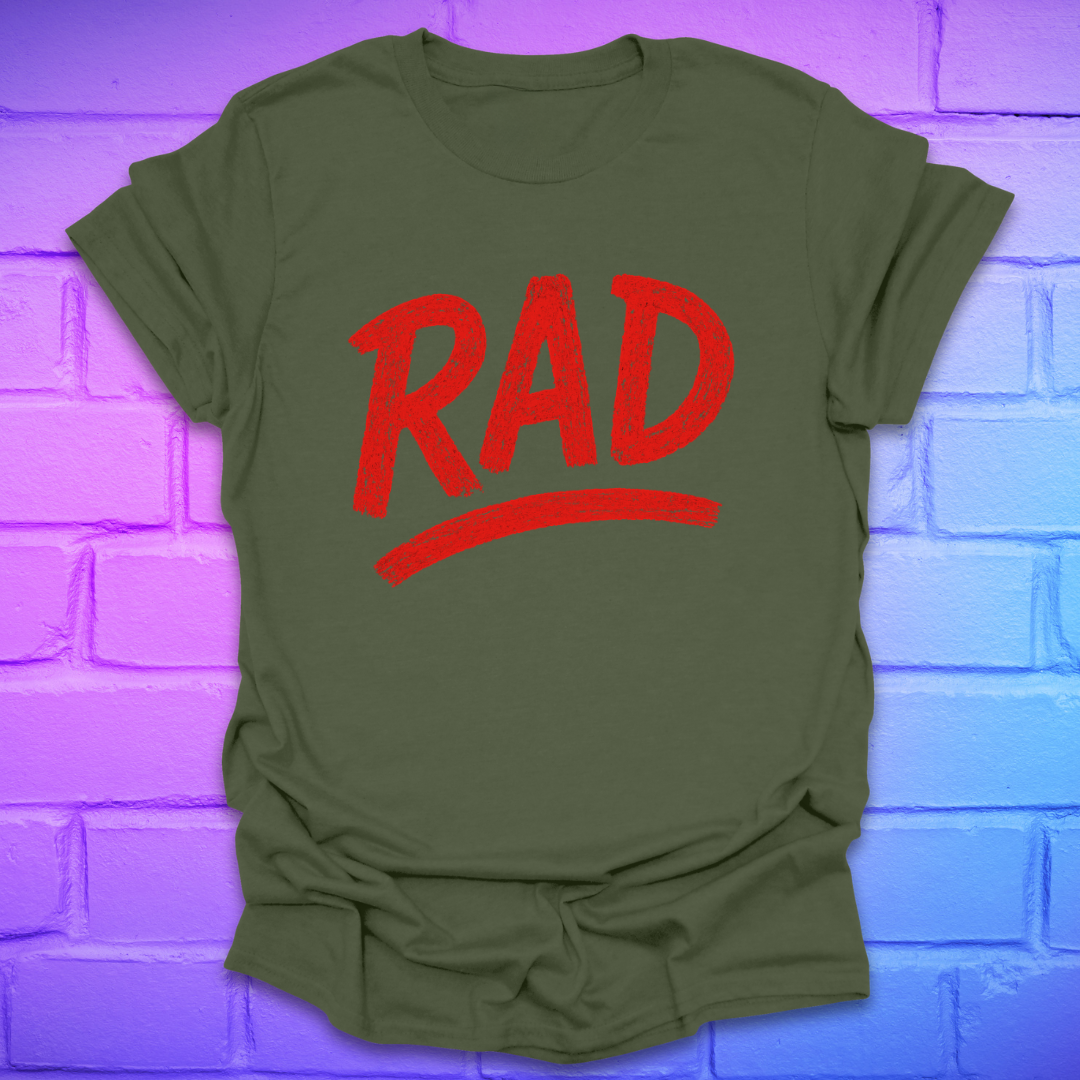 Green t-shirt with red 'RAD' text on a brick wall background