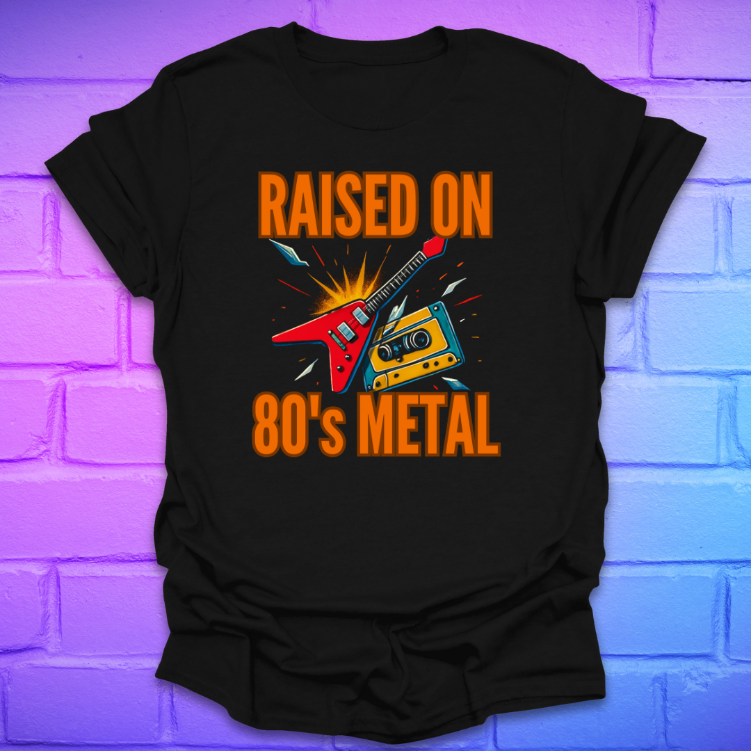 Black t-shirt with 'Raised on 80's Metal' design featuring a guitar and cassette tape on a brick wall background.