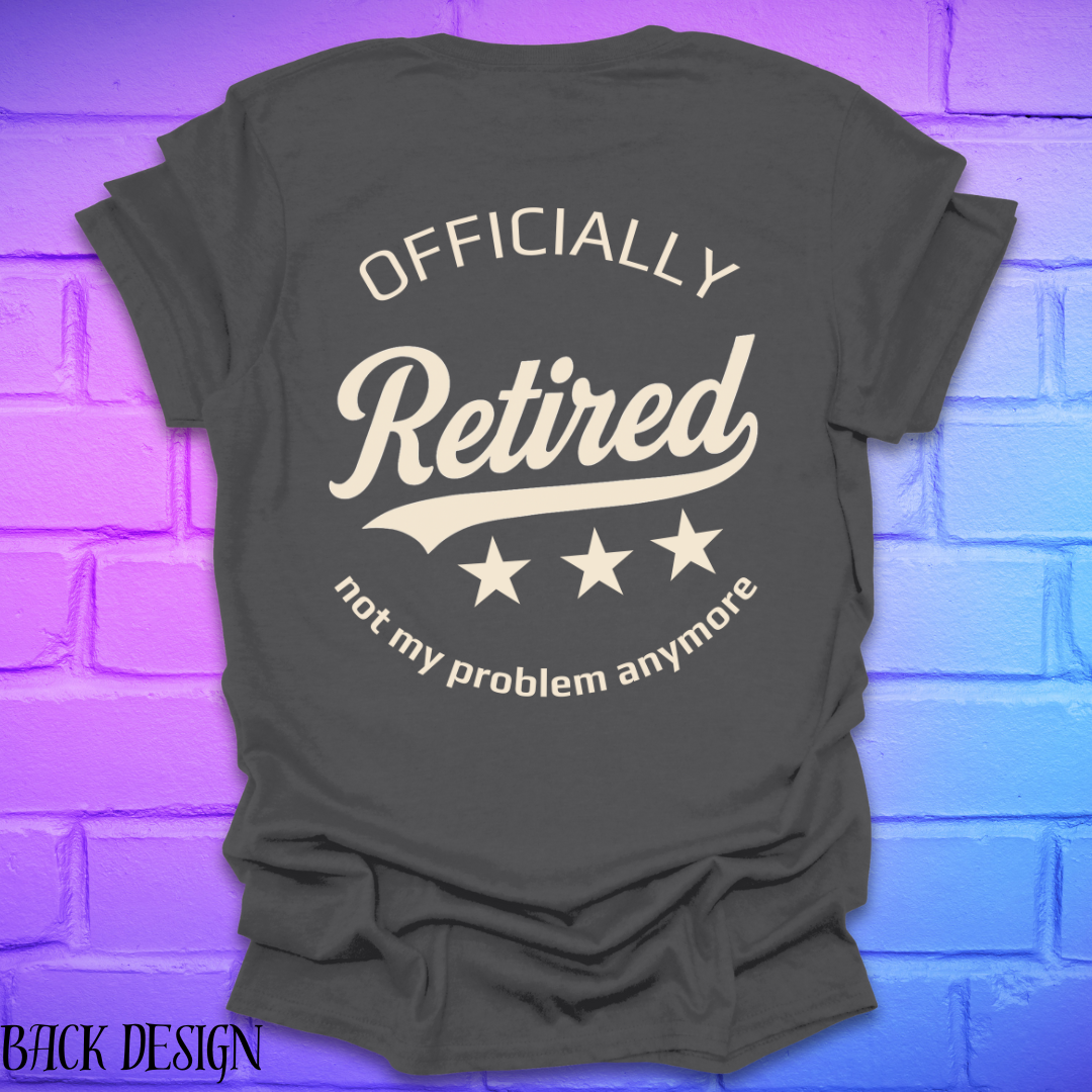 Gray t-shirt with 'Officially Retired, not my problem anymore' text on a brick wall background