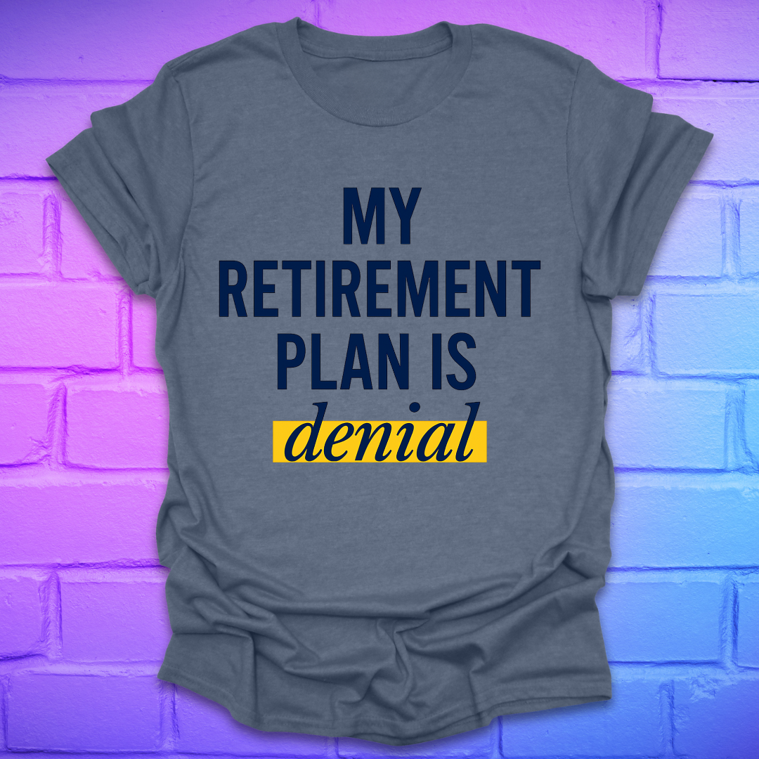 Blue gray t-shirt with 'My Retirement Plan is Denial' text on a brick wall background