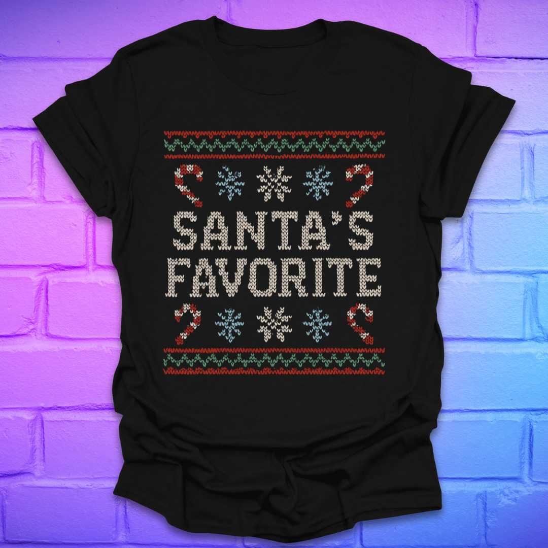 Black t-shirt with Christmas-themed design, and text, 'Santa's Favorite' on a brick wall background