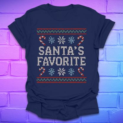 Navy t-shirt with Christmas-themed design, and text, 'Santa's Favorite' on a brick wall background
