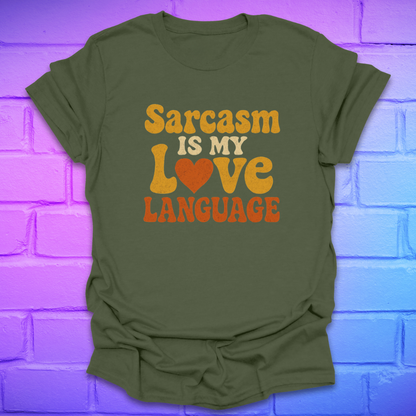 Green t-shirt with 'Sarcasm is my love language' text on a brick wall background