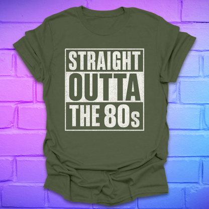 Green t-shirt with plain black/white text, 'Straight outta the 80s' on a brick background.