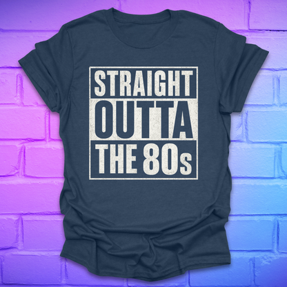Dark blue t-shirt with plain black/white text, 'Straight outta the 80s' on a brick background.