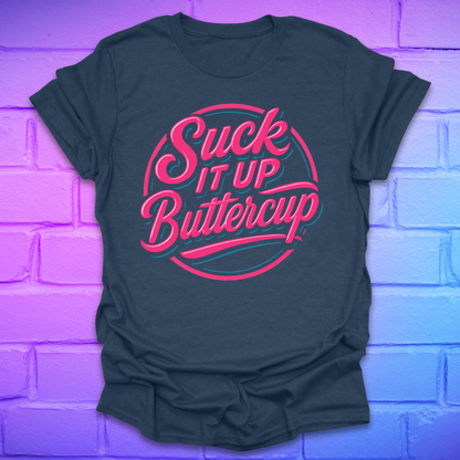 Black t-shirt with 'Suck It Up Buttercup' text in pink and teal on a brick wall background