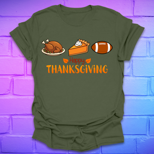 Green t-shirt with thanksgiving theme and text, 'happy thanksgiving' with turkey, pie and football, on a brick background.