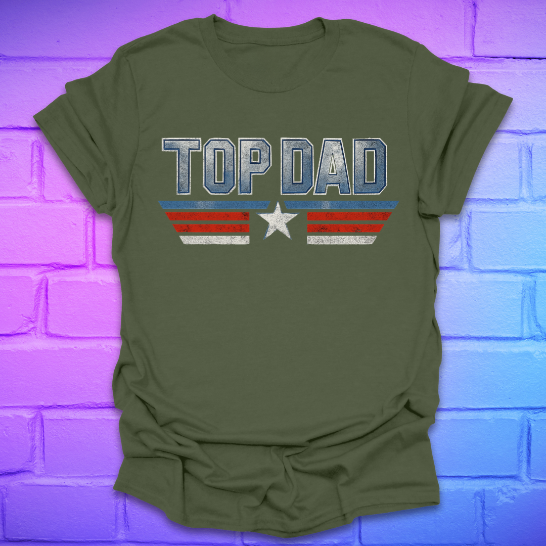 Green t-shirt with text 'Top Dad' with red, white and blue stripes and a star on a brick background.