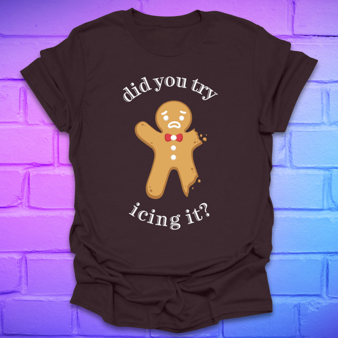 Brown t-shirt with a gingerbread man graphic and text, 'did you try icing it?' on a purple brick wall background