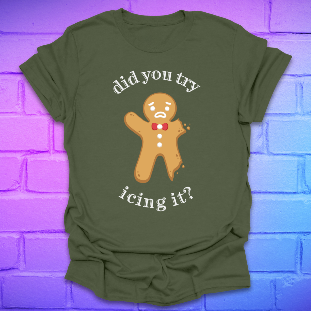 Green t-shirt with a gingerbread man graphic and text, 'did you try icing it?' on a purple brick wall background