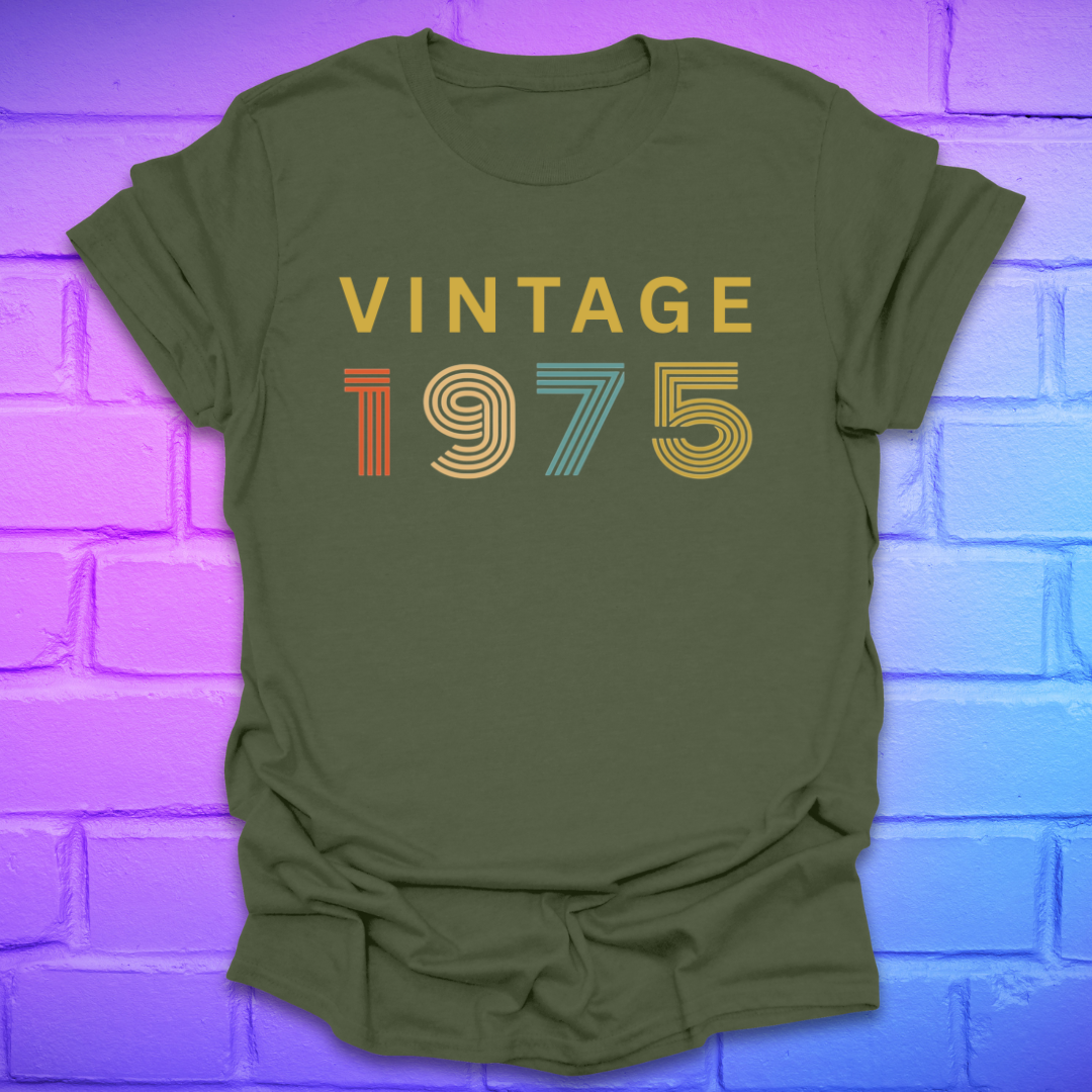 Green tshirt with text 'Vintage 1975' in a retro font, on a brick background.