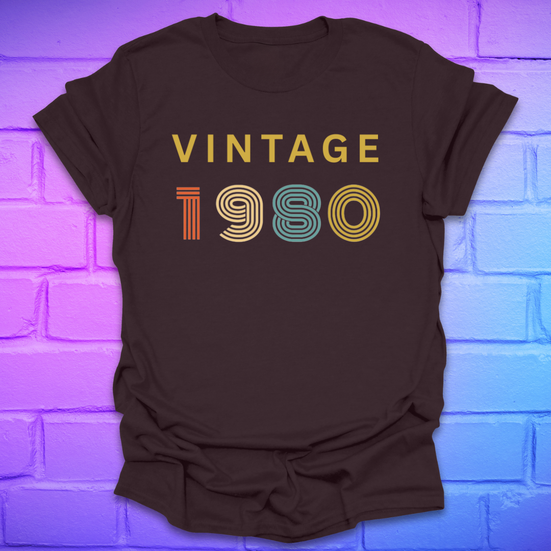 Brown t-shirt with 'Vintage 1980' text on a brick wall background