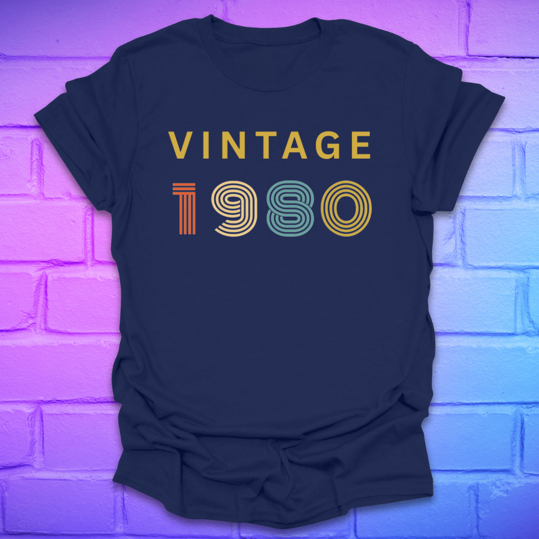 Navy blue t-shirt with 'Vintage 1980' text on a brick wall background