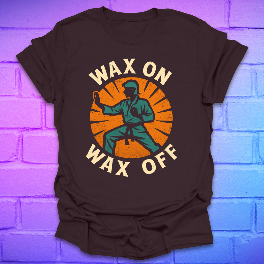 Brown t-shirt with 'Wax On Wax Off' graphic design on a brick wall background