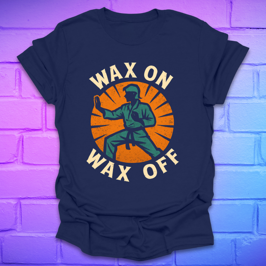 Navy blue t-shirt with 'Wax On Wax Off' graphic design on a brick wall background